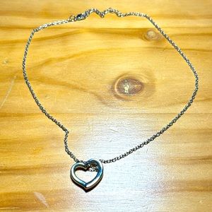 Silver necklace with silver heart